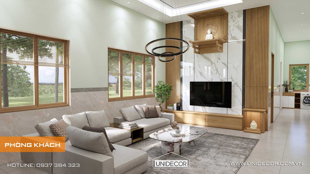 Không gian phòng khách được thiết kế thoáng đãng, với vách tivi hệ lam làm vách ngăn không gian phòng khách
