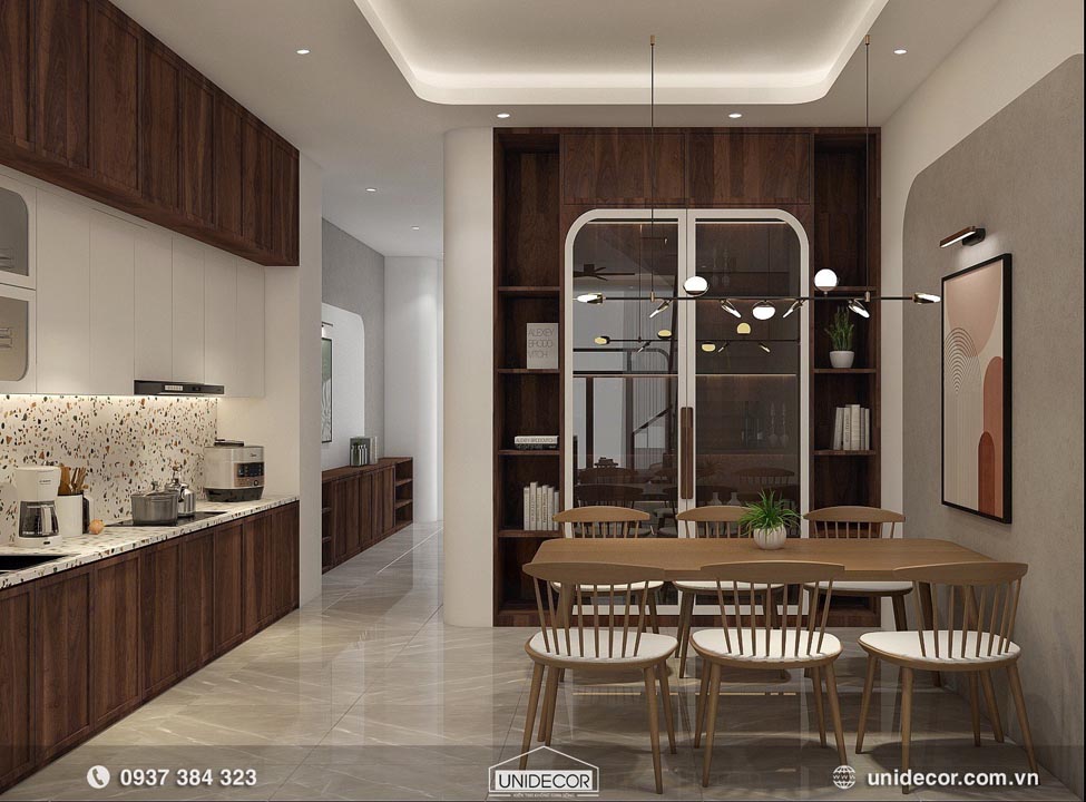 Tổng thể không gian bếp và bàn ăn trong thiết kế nhà đẹp 3 tầng của anh V
